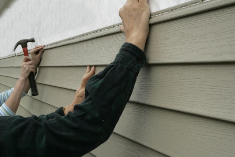 Close-up of Vinyl Siding Installation Process